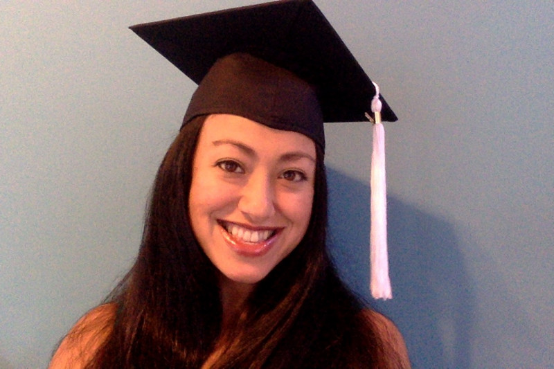 headshot wearing graduation cap