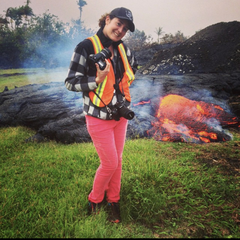 Michelle Mazzetti standing in front of an active Pahoehoe Flow during the 2014 Pahoa Eruption