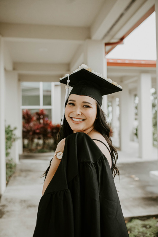 This image is of myself looking back and holding my gown draped over my shoulder.