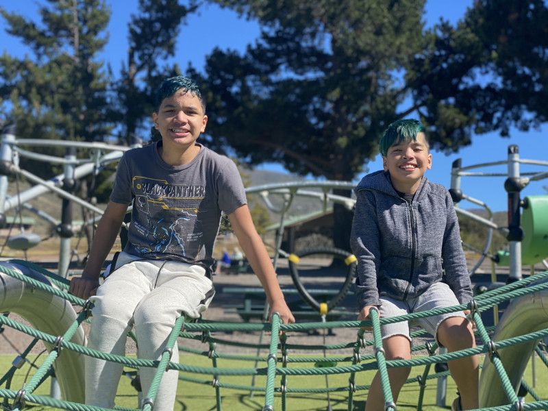 two children on a play structure