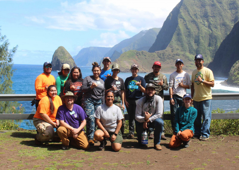 Kalaupapa class smiling with a ocean view