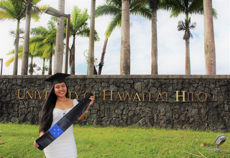 holding my FSM sash up