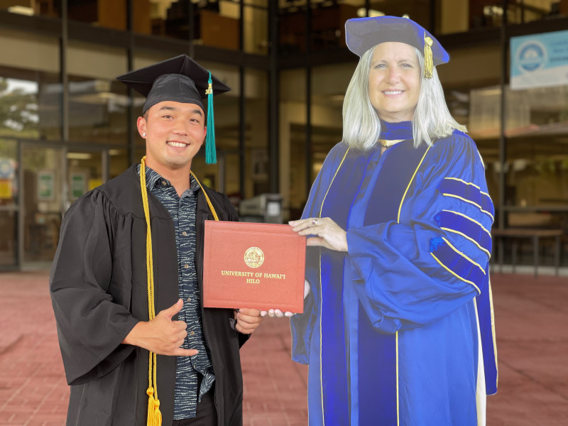 Diploma with Chancellor Bonnie Irwin
