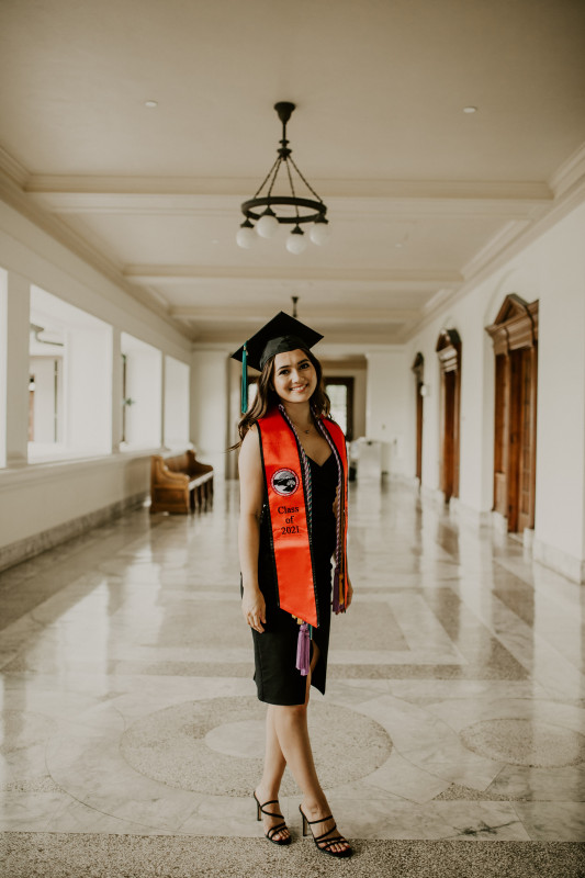 Standing tall, draped in my BSN sash and colorful cords.