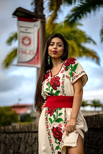 Geneba Revuelta wearing a traditional Mexican dress.