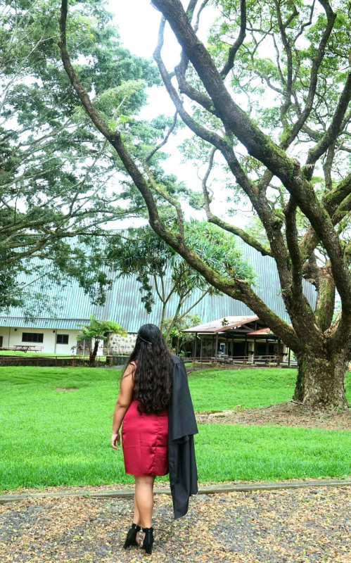 Photo of graduate on campus