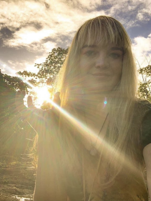 This picture of me beside the sun was taken in a serene forestry area behind UH Hilo, and depicts the importance of radiating the light of kindness in all that you do.