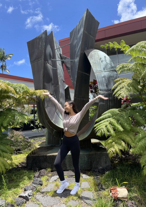 A photo of me in front of one of the UH Hilo sculptures