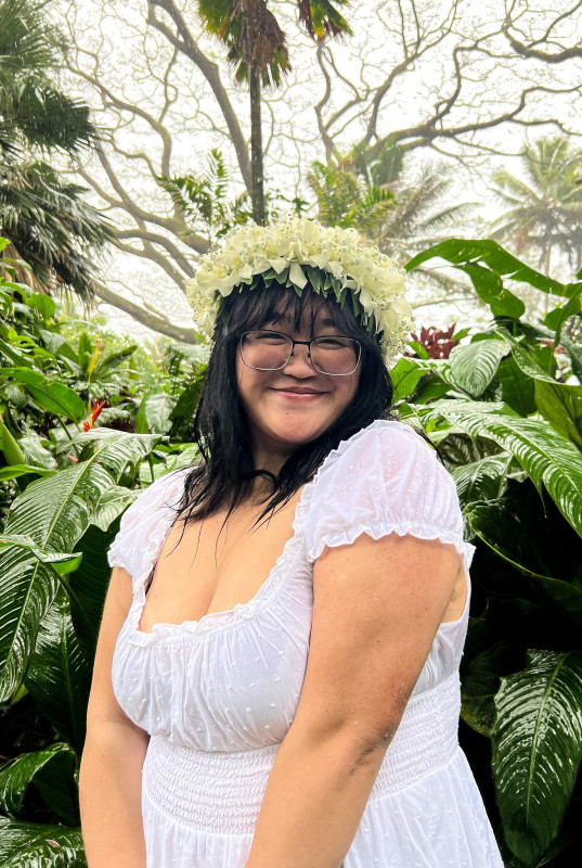 Graduate photograph taken at Hawaii Botanical Garden.