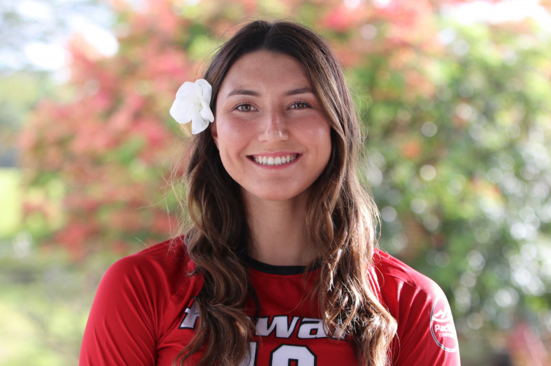 A picture of Alex posing for senior year picture photo for her senior season of UH-Hilo Volleyball.