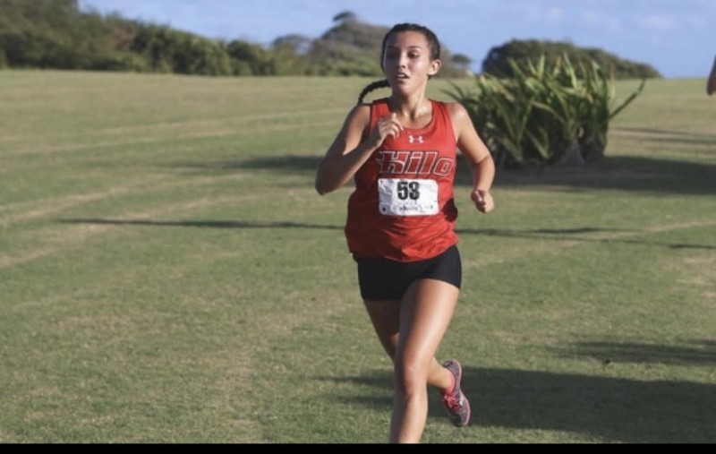 Makena running a race for UH Hilo Cross Country team