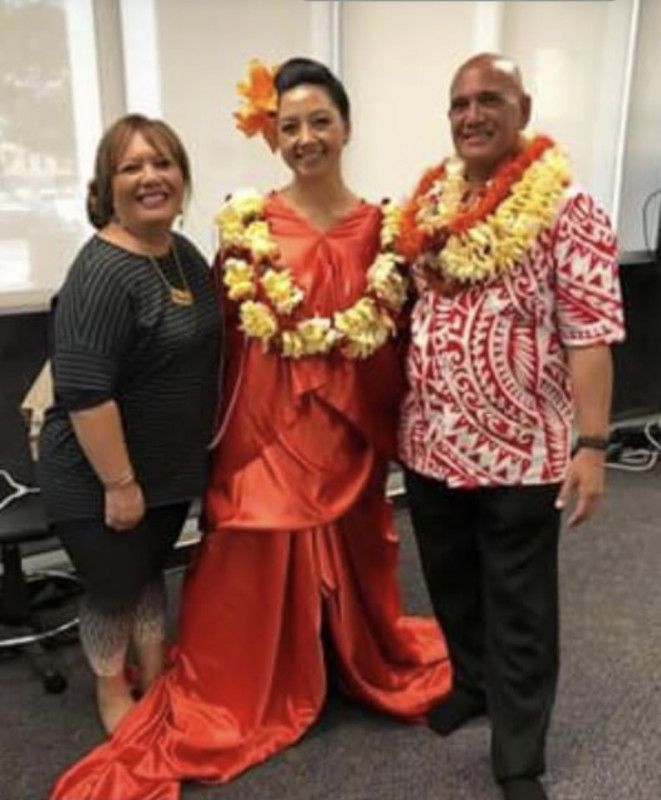 Kumu Kimo Keaulana and Kaʻanoʻi Akaka.  Wahine holo lio paʻu demonstration by Uncle Kimo in the school library.