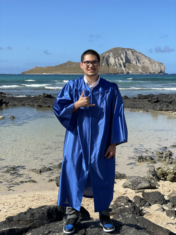 This is baby makapu’u a small beach past the light house hike with beautiful clear ocean waters and a lone island you can see in the distance.