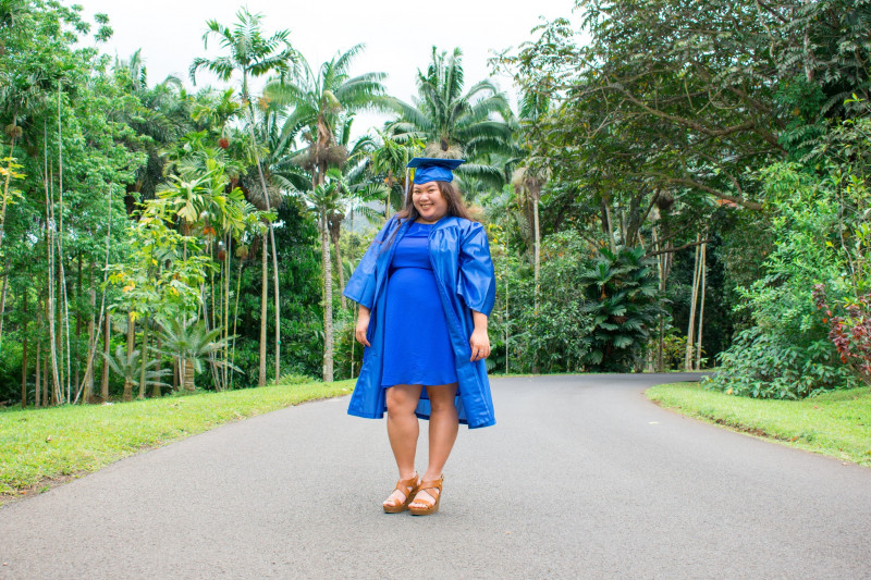 Cap/gown photo taken at Ho'omaluhia Garden