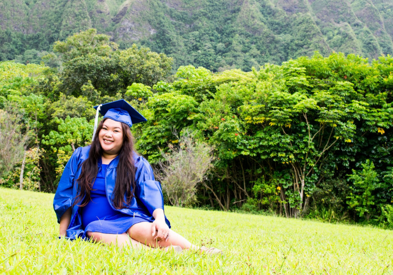 Cap/gown photo taken at Ho'omaluhia Garden