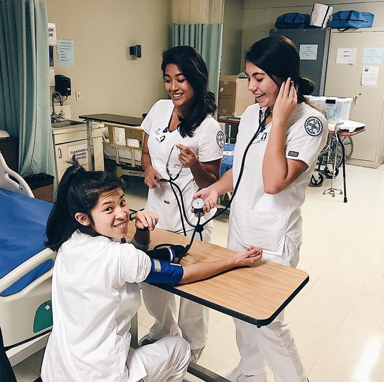 CNA Students practicing their BP skills