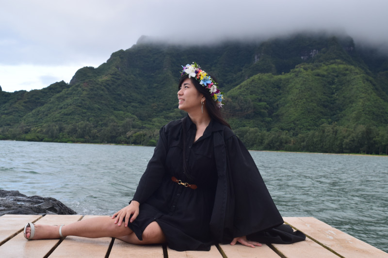 Me wearing a haku and the gown, looking up at the sky. This picture was taken on the Windward side of Oahu
