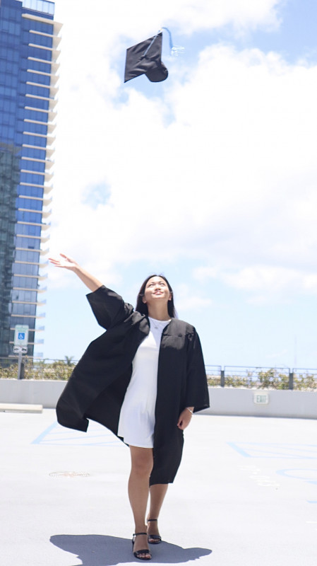 Here is a picture of me throwing my cap in the air.