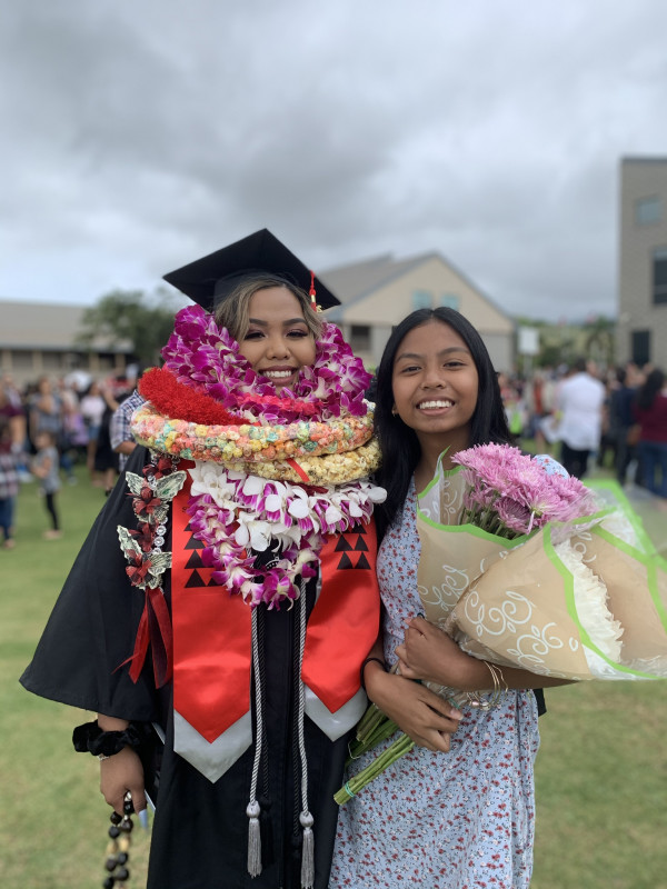 Graduate and sister.