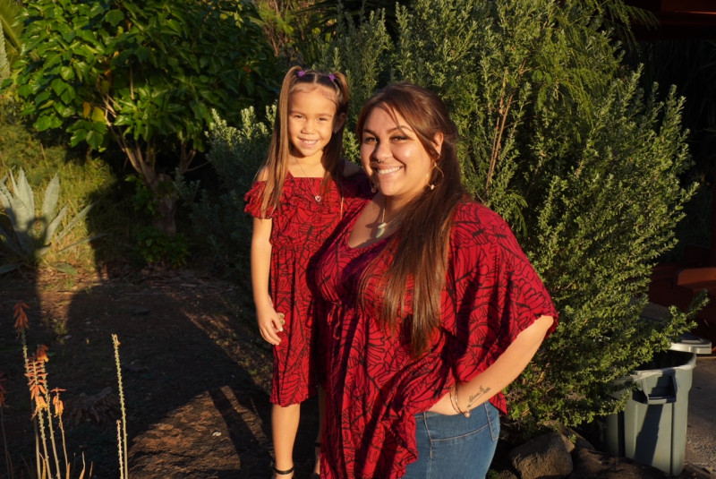 In this picture it is my daughter, and I. Up Makaha Valley during a sunset.