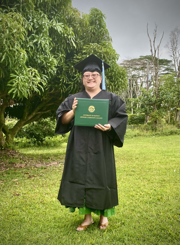 Graduate in front of Mango tree