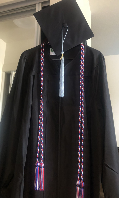 My graduation Cap & Gown w/Veteran Cord