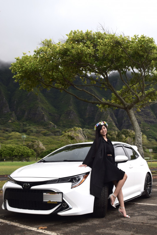 This picture is me with my boyfriend's car at Kualoa Regional Park
