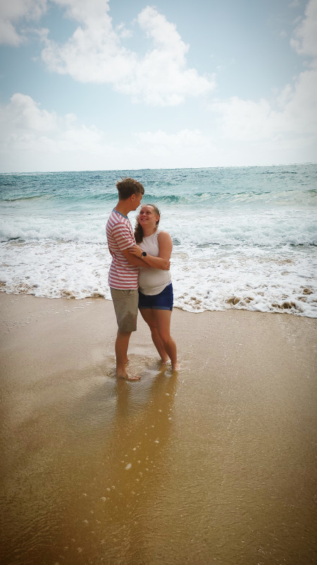 Graduate, Kasandra Comer with her support person, her husband.