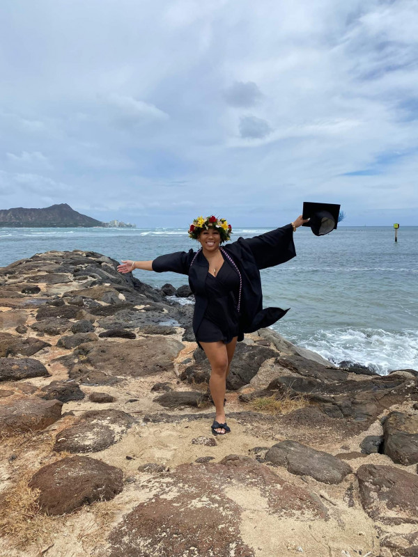 Cap and gown by the water with DiamondHead