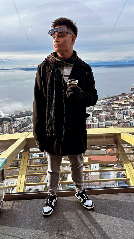 Here’s a picture of me posing on top of the space needle in Seattle