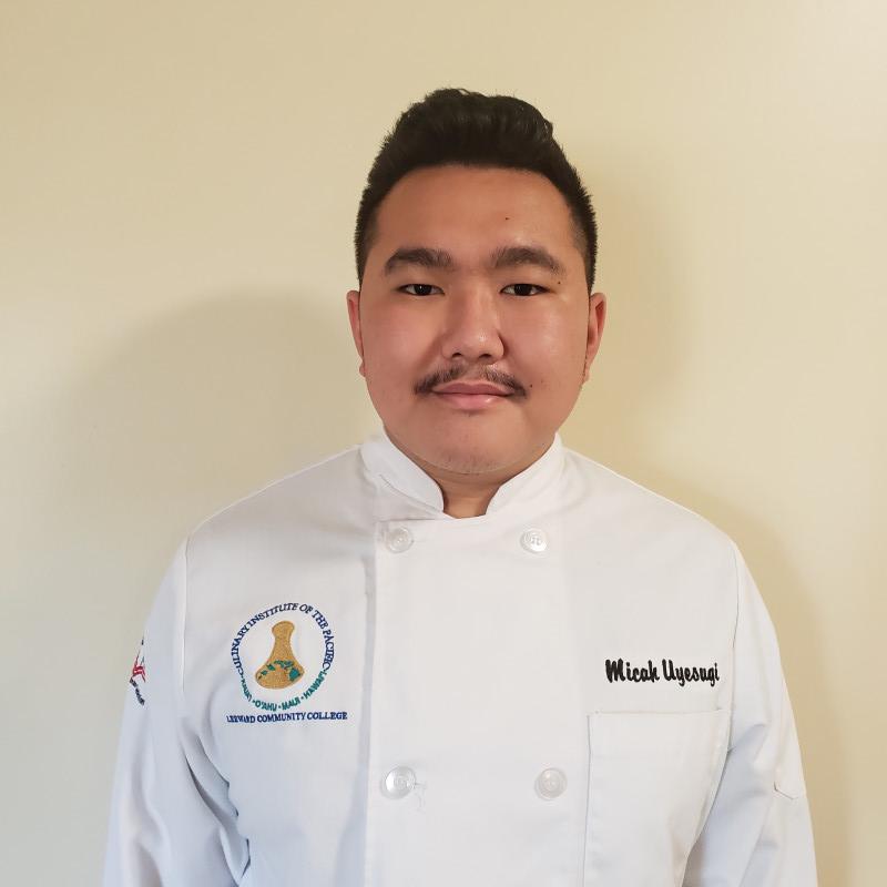A portrait photo of me in my chef's coat