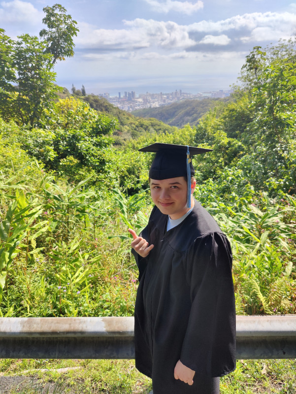 Me, standing in the mountains with Honolulu in the backround.