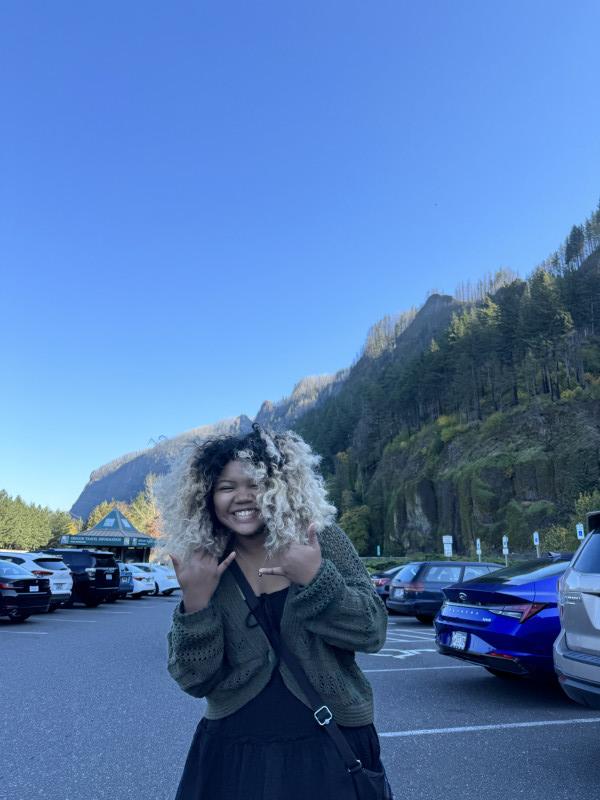 Posing in front of mountains