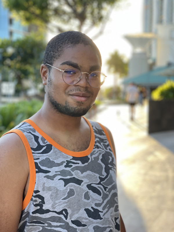African American male (20 years old) by the Pearlridge Center (Ward Village)