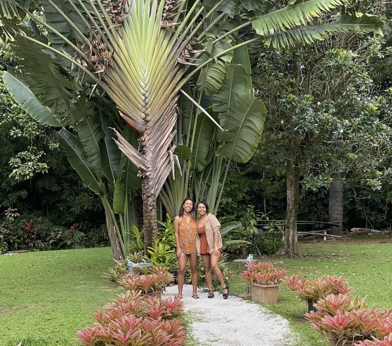 My sister and I in a garden.