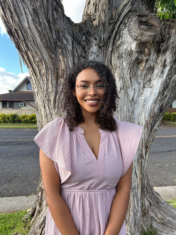 Me standing next to a tree.