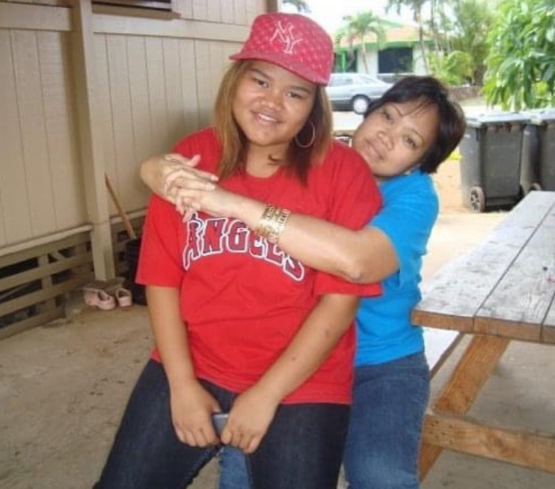 Me sitting on my mom's lap in Nanakuli.