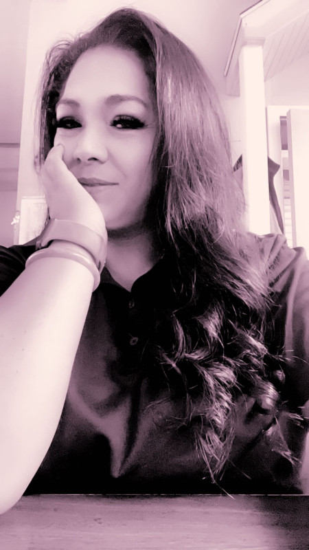 Its a black and white photo of me sitting at my desk